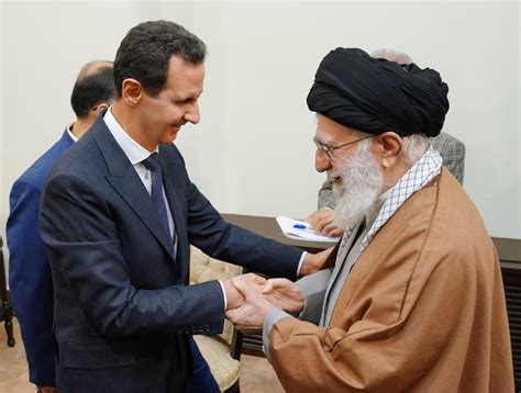 Iran’s president lands in Syria for rare meeting with Assad